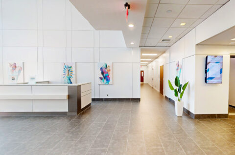 Modern office lobby with contemporary furnishings at 900 Broken Sound Parkway in Boca Raton