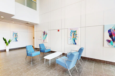 Modern office lobby with contemporary furnishings at 900 Broken Sound Parkway in Boca Raton